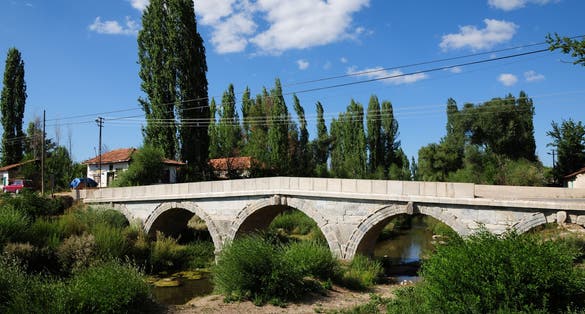 photo of view of The historical bridge in Cavdarhisar, Kütahya, Turkey was built during the Roman period.