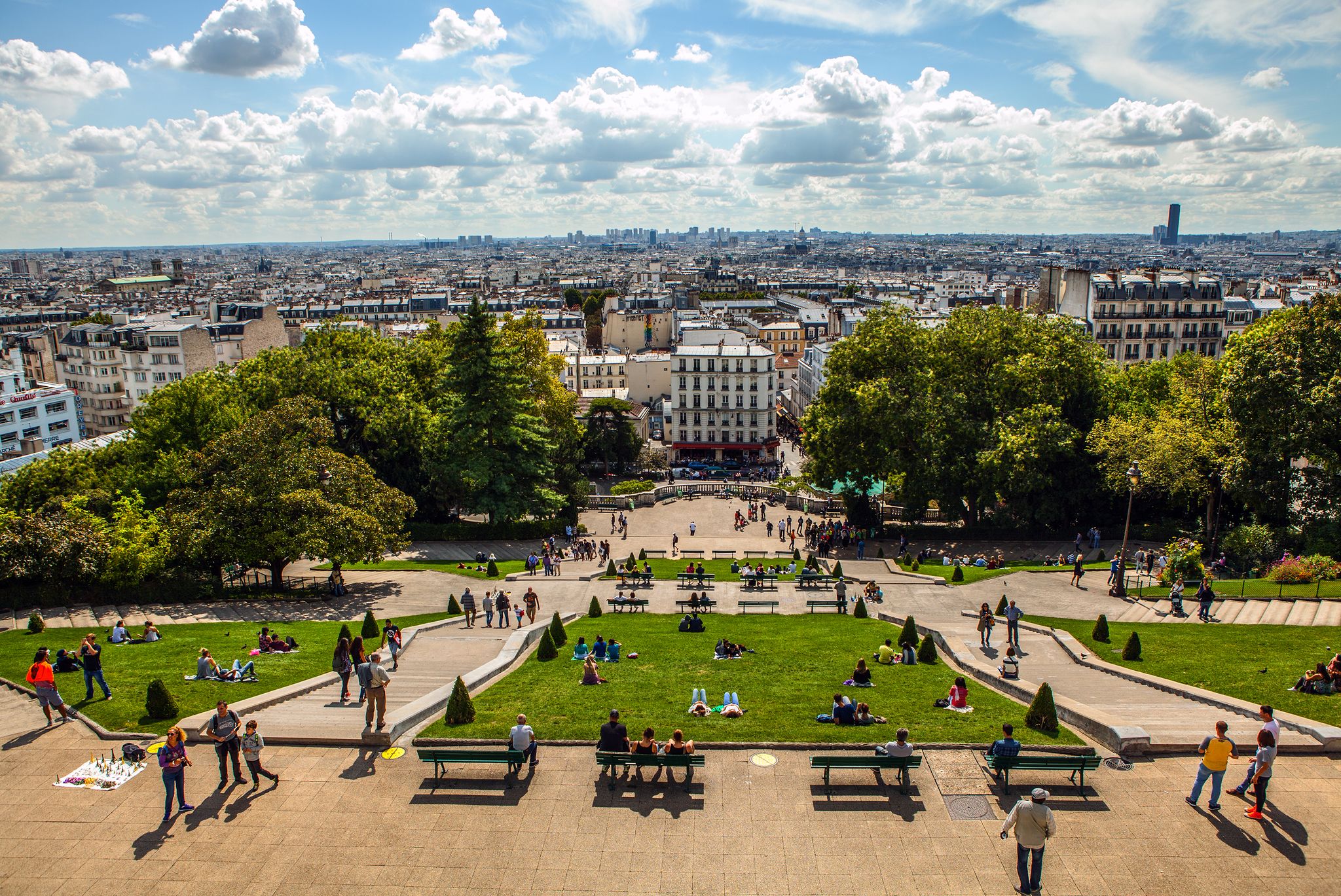 View from Montmartre to summer Paris and beautiful blue sky with soft clouds.