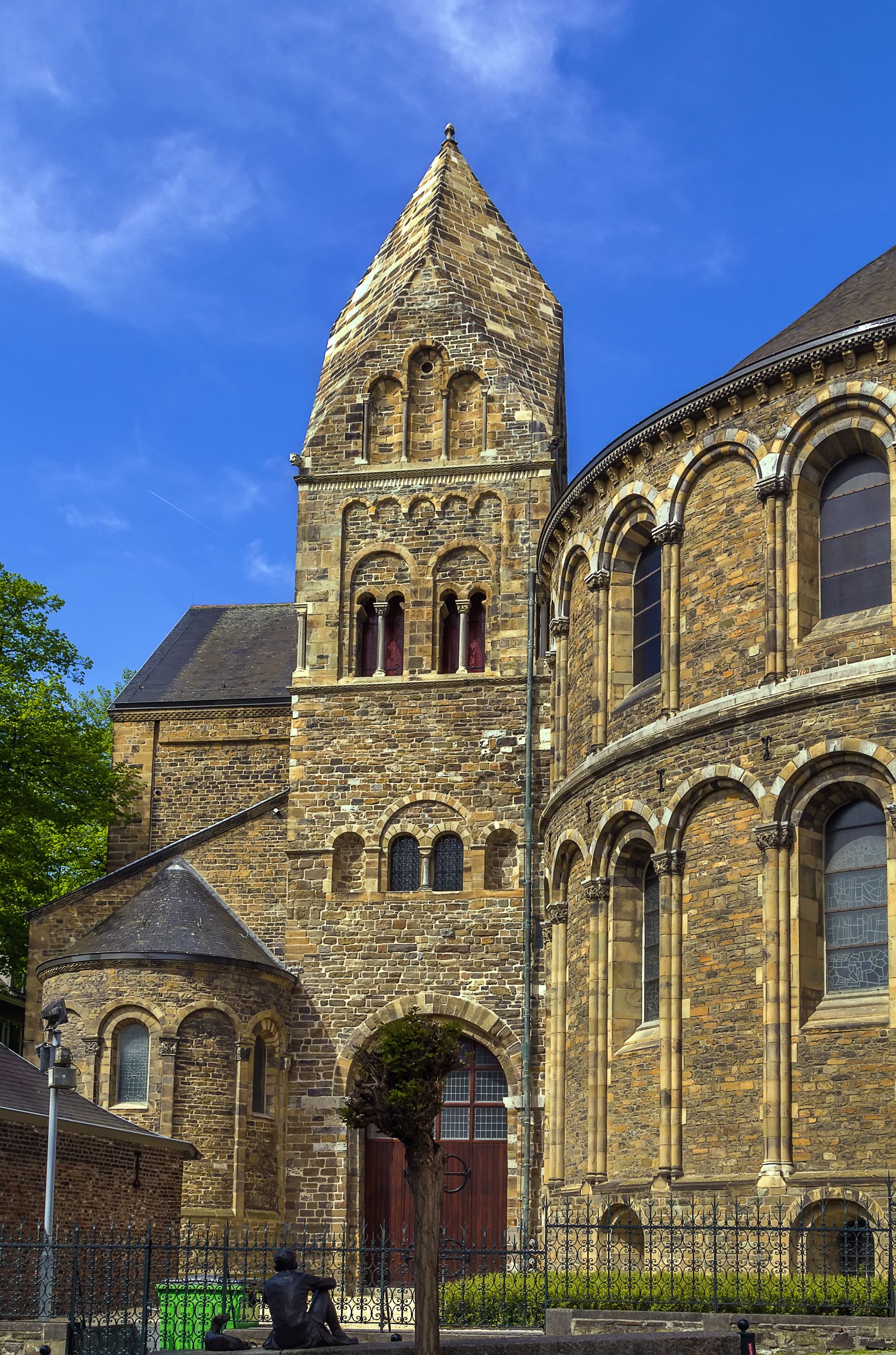 photo of exterior of the rear of the Romanesque Church Basilica of Our Lady Church in the historic center in Maastricht, the Netherlands.