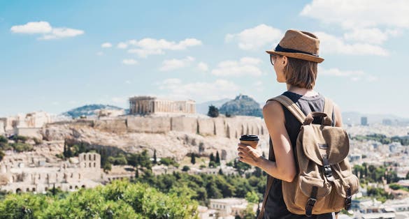 Photo of traveler girl enjoying vacations in Athens, Greece.