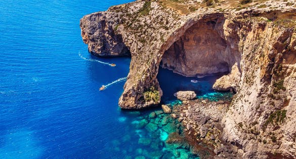 Photo of beautiful Blue Grotto caves and cliff in Malta.