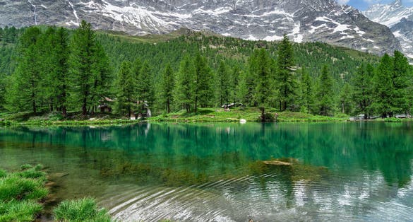 The scenic Blue Lake (Lago Blu) surrounded by a beautiful alpine landscape near Cervinia, Aosta Valley, Italy