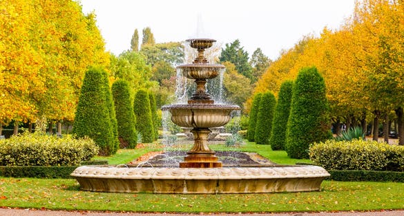 Photo of Peaceful scenery with fountain in regent's park of London, UK.