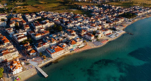 Photo of aerial view over the coastal town of Paralia Katerini, Greece.