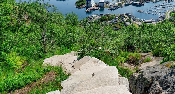 Djevelporten or Devils gate in Floya mountain hiking trail. Svolvaer trekking trail in Lofoten island, Scandinavia, Norway, activity famous places