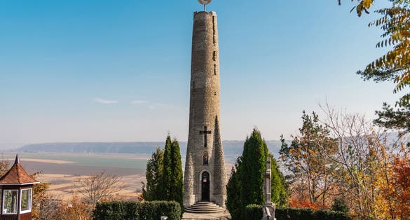Photo of Thanksgiving or Gratitude Candle, tall candle-shaped monument in Soroca city, Moldova.