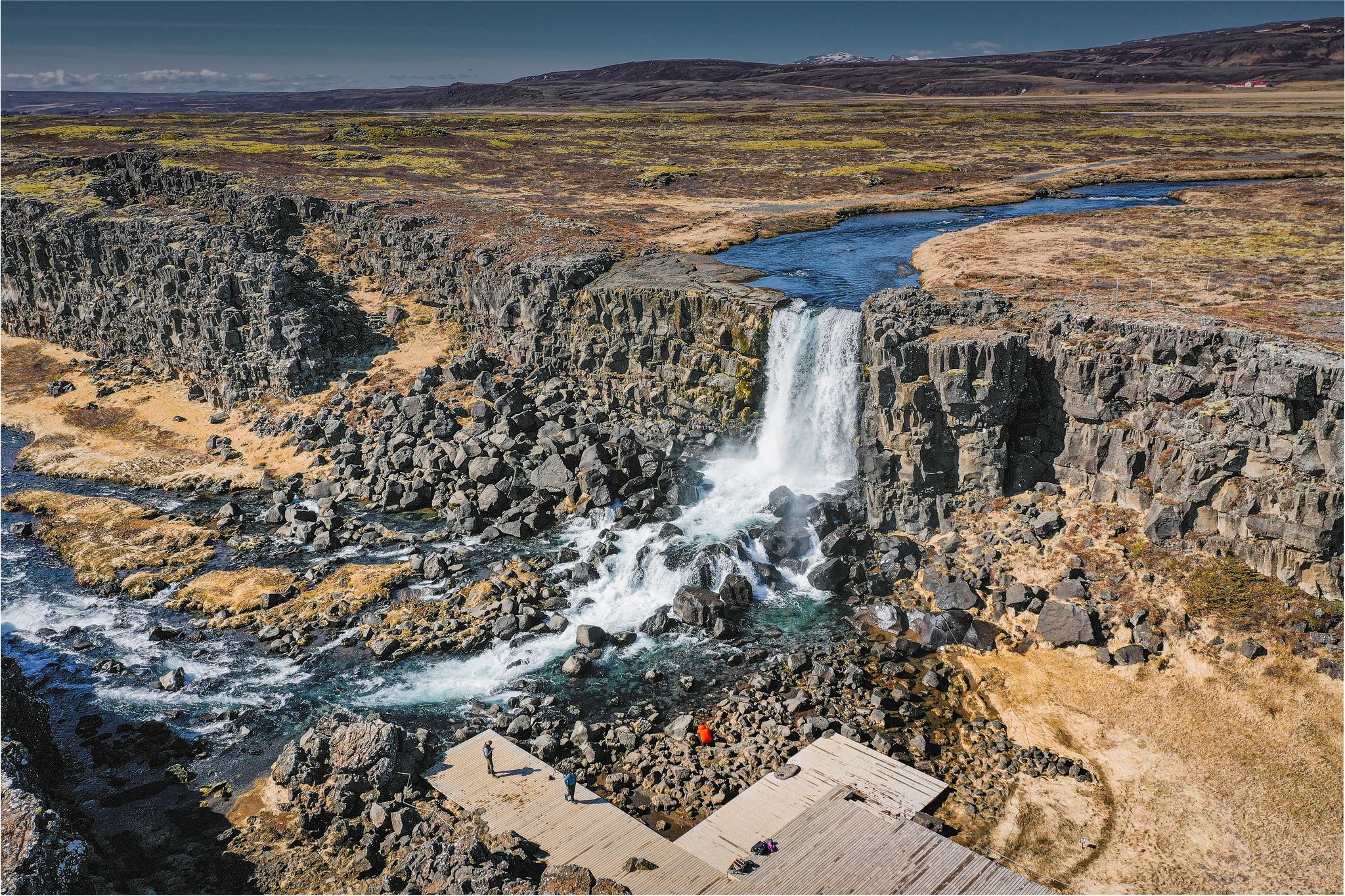 photo of aerial view of oxarárfoss waterfall in pigvenllir national park, Iceland.