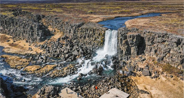 photo of aerial view of oxarárfoss waterfall in pigvenllir national park, Iceland.
