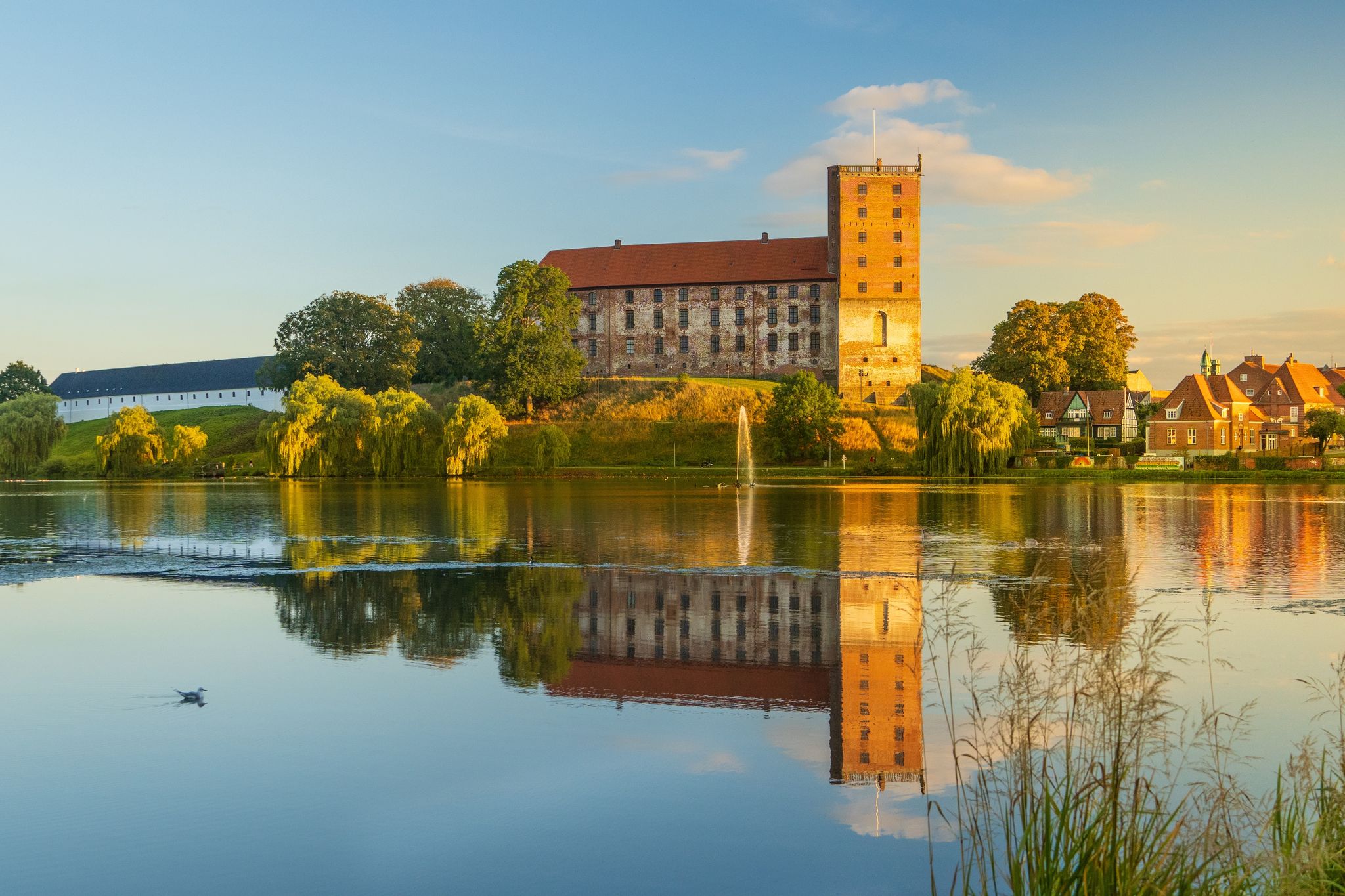 Photo of Koldinghus, medieval castle and museum  by the lake at Kolding, Denmark. 