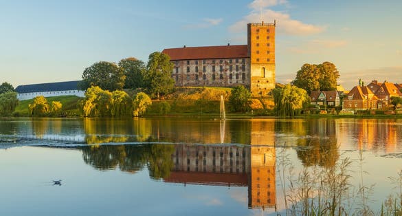 Photo of Koldinghus, medieval castle and museum  by the lake at Kolding, Denmark. 