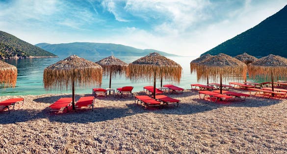 Panoramic morning view of Antisamos Beach. Captivating spring seascape of Ionian Sea. Romantic outdoor scene of Kefalonia island, Sami town location, Greece, Europe. Traveling concept background.