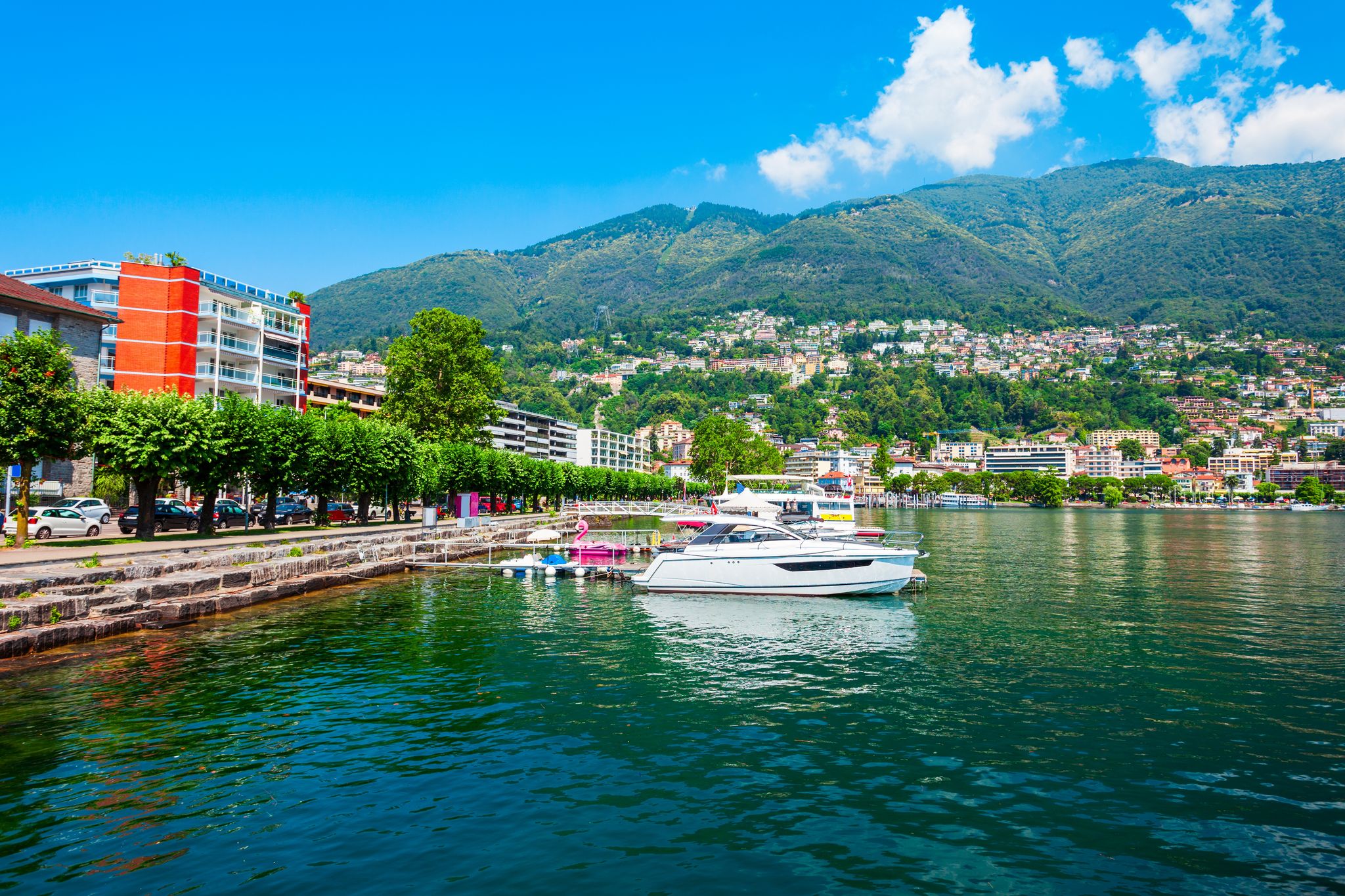 Photo of Locarno port with yachts and boats. Locarno is a town located on Lake Maggiore in Ticino canton of Switzerland.