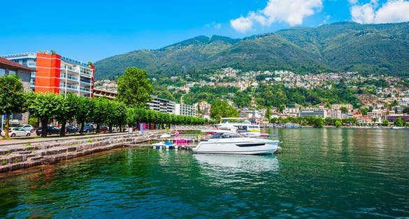 Photo of Locarno port with yachts and boats. Locarno is a town located on Lake Maggiore in Ticino canton of Switzerland.
