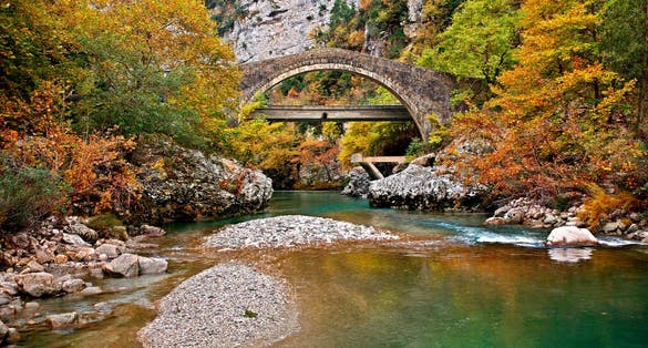 EPIRUS, GREECE. Politsa (or "Politsas") bridge over Arachthos river, Katsanochoria region, North Tzoumerka municipality, Ioannina prefecture.