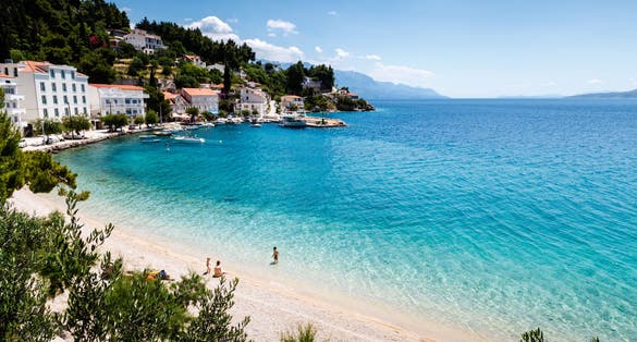 Photo of beautiful Adriatic Beach and Lagoon with Turquoise Water near Split, Croatia.