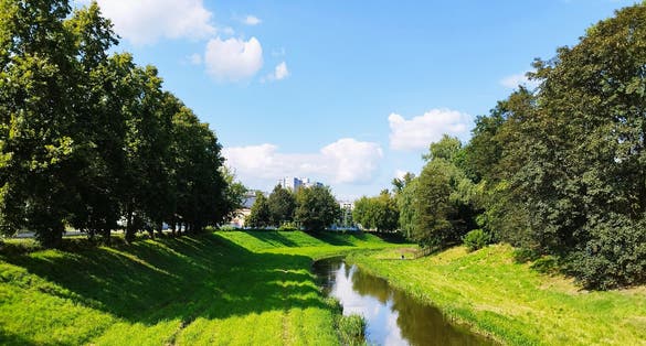 Photo of the Lublin people's park and the Bystrzyca River, Poland.