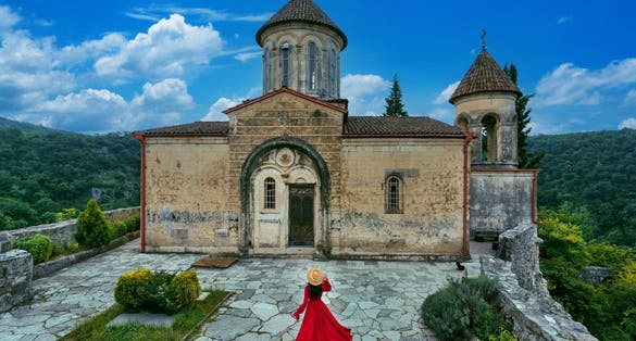 Photo of tourist visiting at Motsameta monastery, Kutaisi, Georgia.