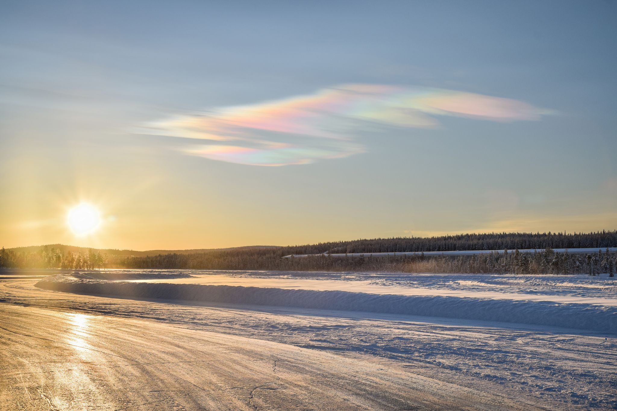 Photo of frosty winter sunset in Ivalo, Lapland.