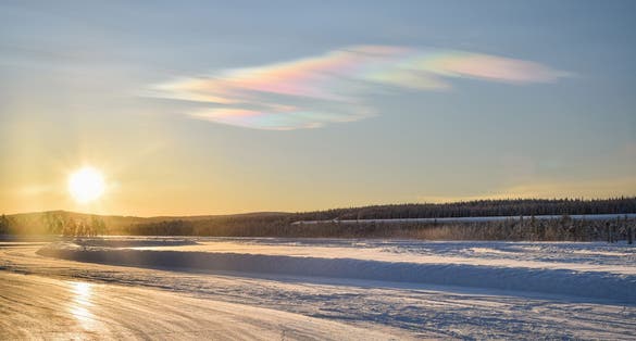 Photo of frosty winter sunset in Ivalo, Lapland.