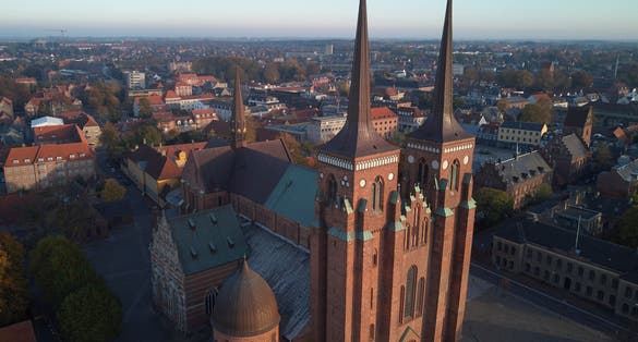 Photo of aerial view of Roskilde Cathedral, church of the Danish royal family in Denmark.