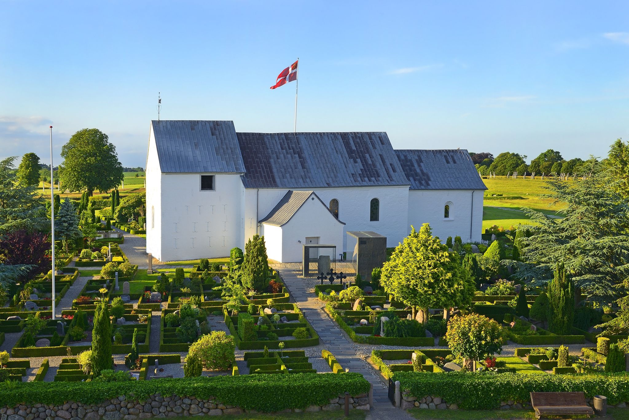 Photo of aerial view of Jelling Church in Jelling village, Jutland, Denmark.