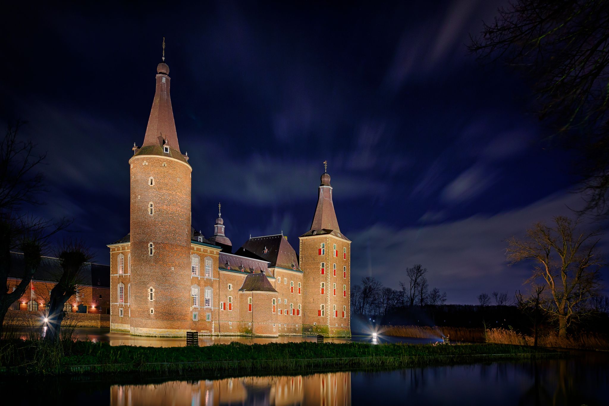 photo of Castle Hoensbroek at night in Heerlen, Netherlands.