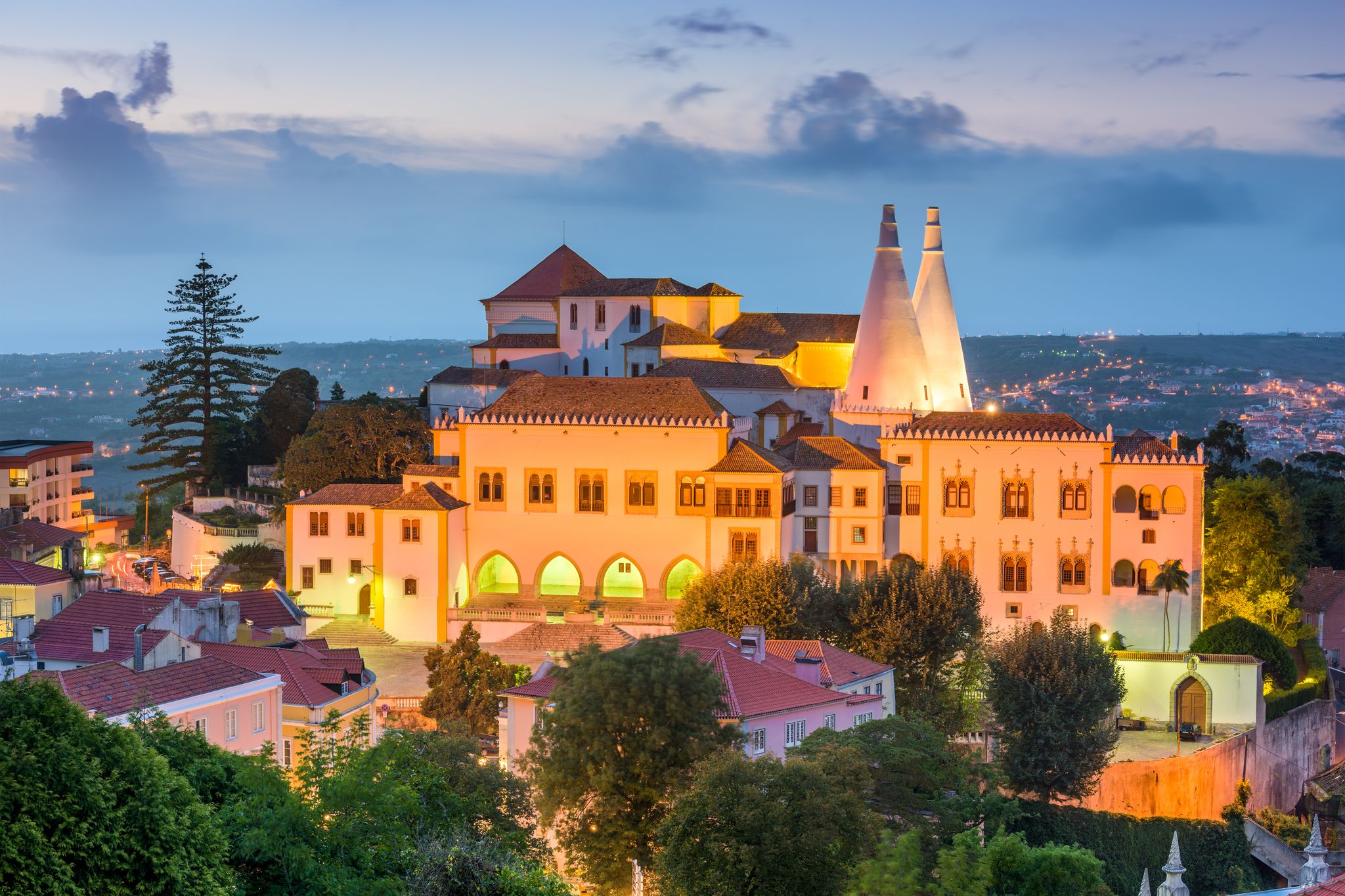 Photo of Palace of Sintra (Palacio Nacional de Sintra) in Sintra at night, Portugal.