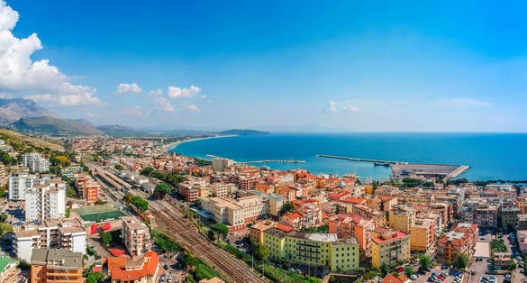 Panoramic sea landscape with Formia, Lazio, Italy. Scenic resort town village with nice sand beach and clear blue water. Famous tourist destination in Riviera de Ulisse