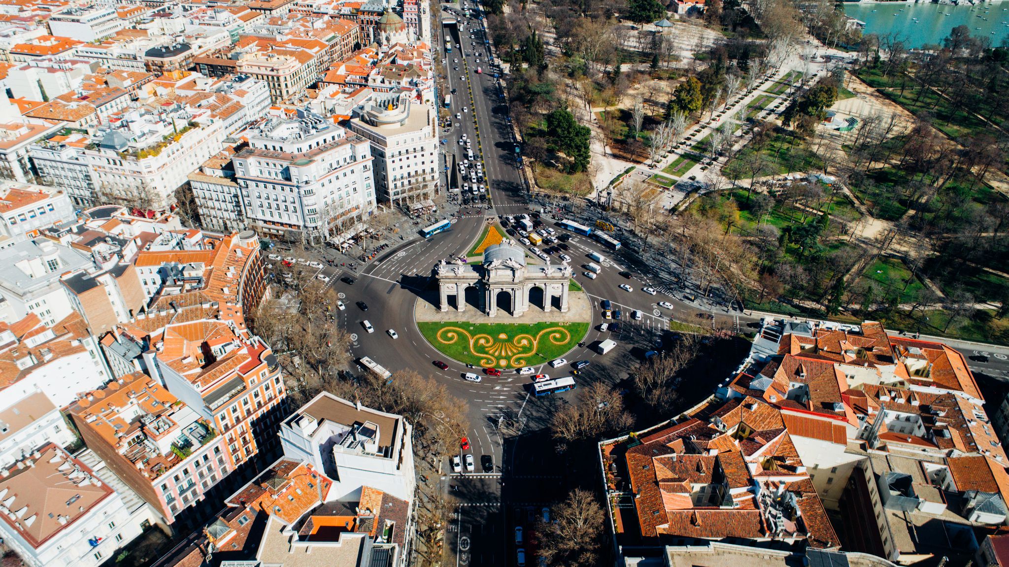 photo of aerial view of the Puerta de Alcalá, Neo-classical monument in the Plaza de la Independencia in Madrid, Spain. One of Madrid's most famous landmarks.