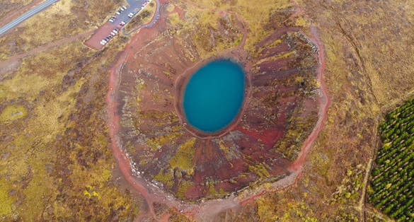 photo of aerial view of kerid, is a beautiful crater lake of a turquoise color located on the southwest of Iceland.