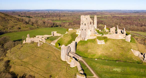 Photo of aerial view of Corfe Castle, Dorset, England.