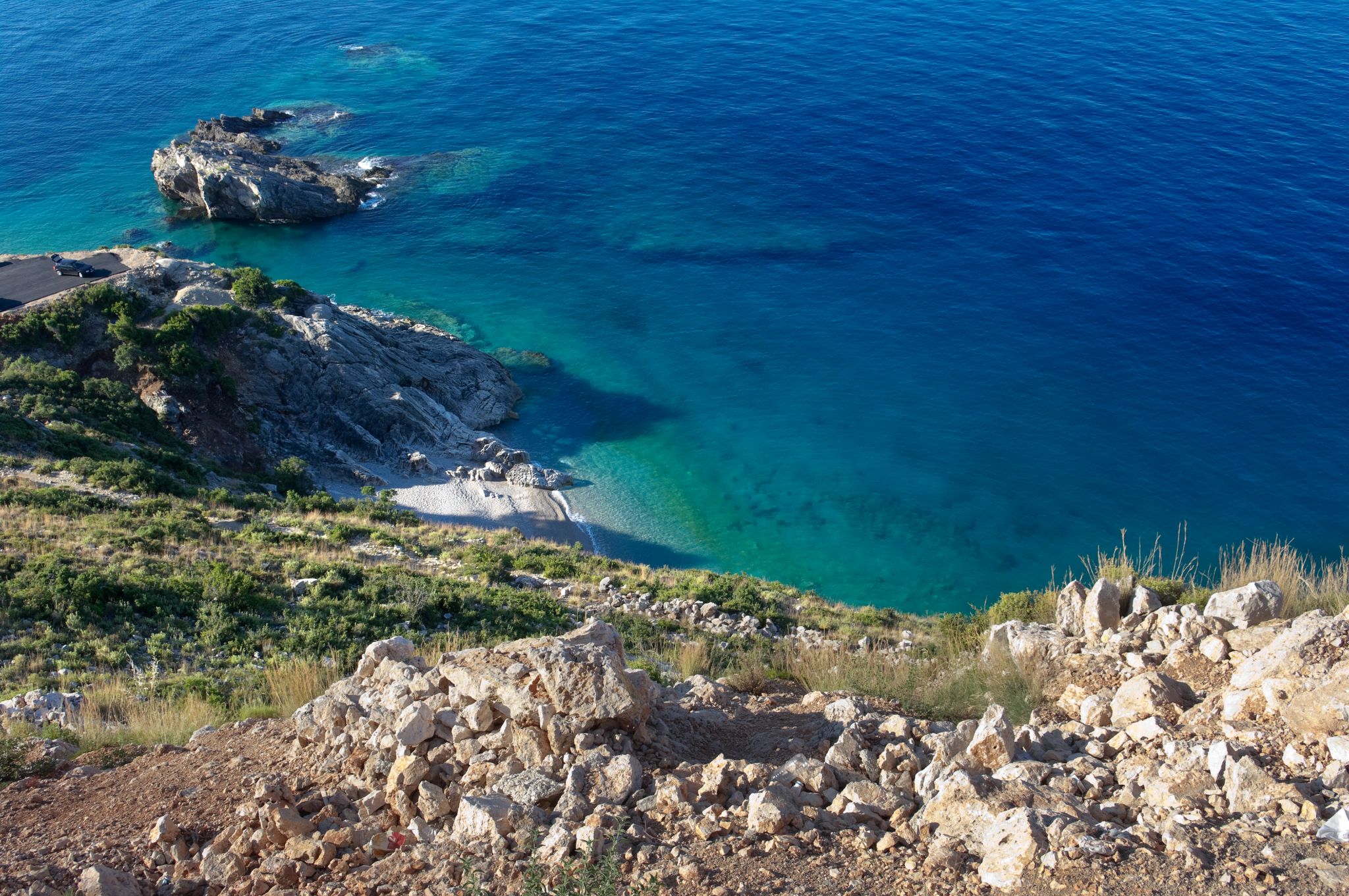 Photo of cliff on the blue sea of Jale Beach, Albania.
