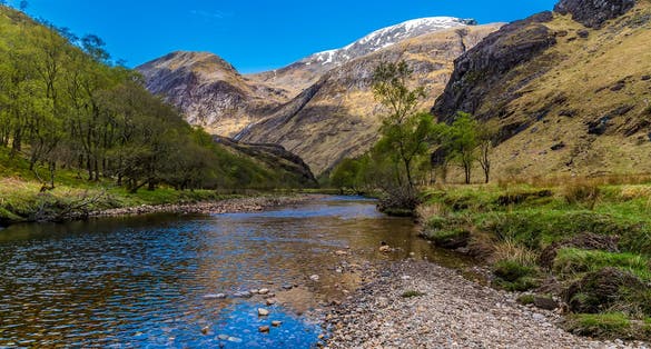 Photo of A view down the River Nevis from the Steall Waterfall in Glen Nevis, Scotland on a summers day , Scotland .