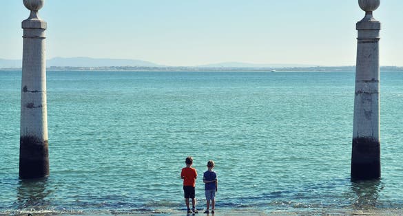 Relax near Cais das Colunas and theTagus River (Rio Tejo), Praca do Comercio - Commercial Square in Lisbon, Portugal.