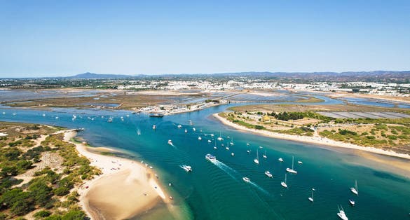 Aerial view of the Tavira Island beach, a tropical island near the town of Tavira, part of the natural park of Ria Formosa in Algarve region of south Portugal