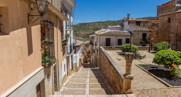 Photo of Old cobblestoned street in historic town Alcaraz, Spain