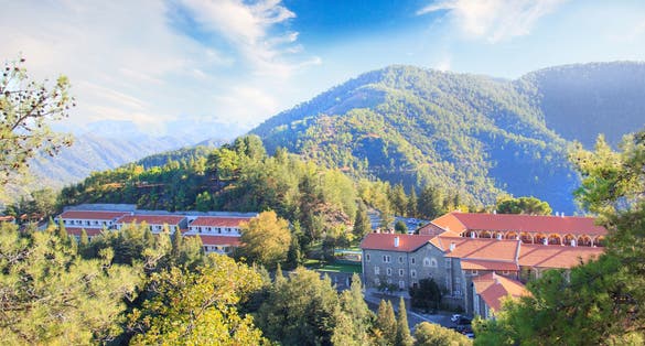 Photo of beautiful view of the Trooditissa monastery in the Cedar Valley Nature Reserve in Cyprus.