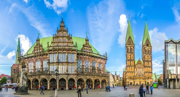 Photo of ancient Bremen market square in the centre of the Hanseatic City of Bremen with view on famous Church of Our Lady.