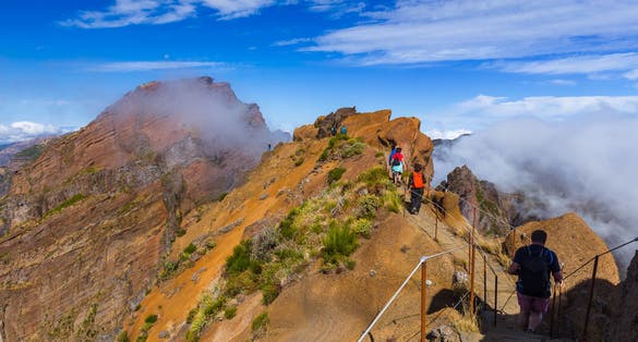 Hiking Pico do Arierio and Pico Ruivo - Madeira Portugal - travel background.