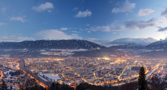 photo of panorama of Innsbruck at night photographed from Hungerburg, Innsbruck, Tyrol, Austria.