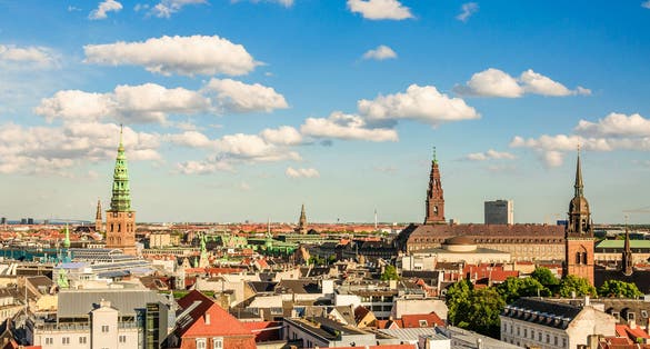 Photo of amazing panorama of the old part of the city from the observation deck at the Round tower (Rundetaarn) in Copenhagen, Denmark.