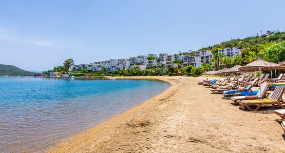 Photo of Ortakent Bay and beach view in Bodrum. Bodrum is populer tourist destination in Turkey.