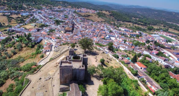 photo of aerial view of the beautiful Cortegana Castle in Huelva, Spain.