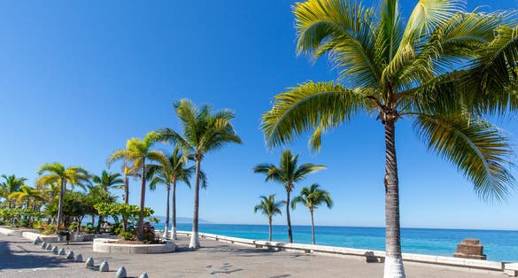 Photo of Puerto Vallarta sea promenade, El Malecon, with ocean lookouts, beaches, scenic landscapes hotels and city views .