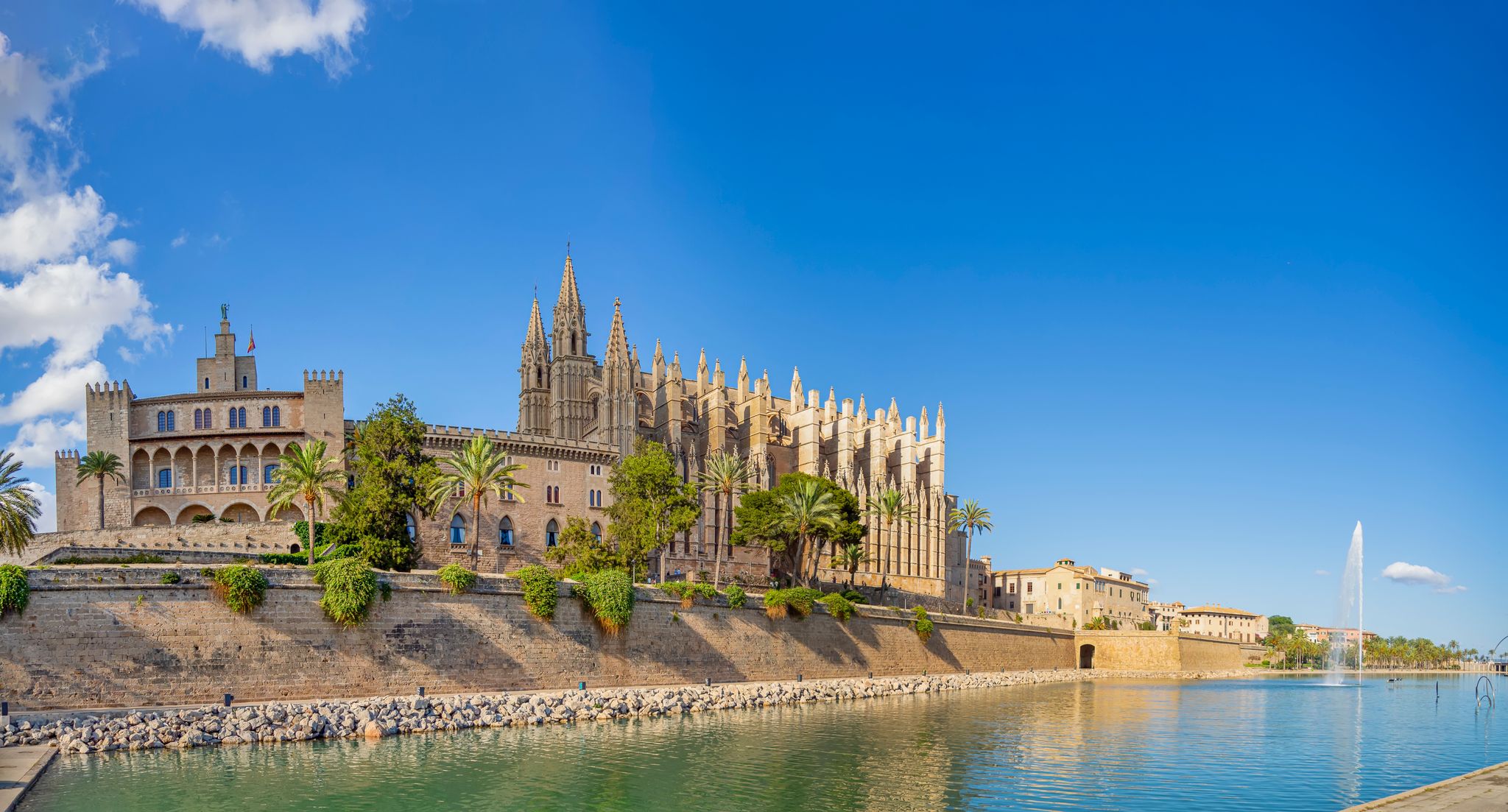 photo of a beautiful morning on Royal Palace of La Almudaina in Palma, Spain.