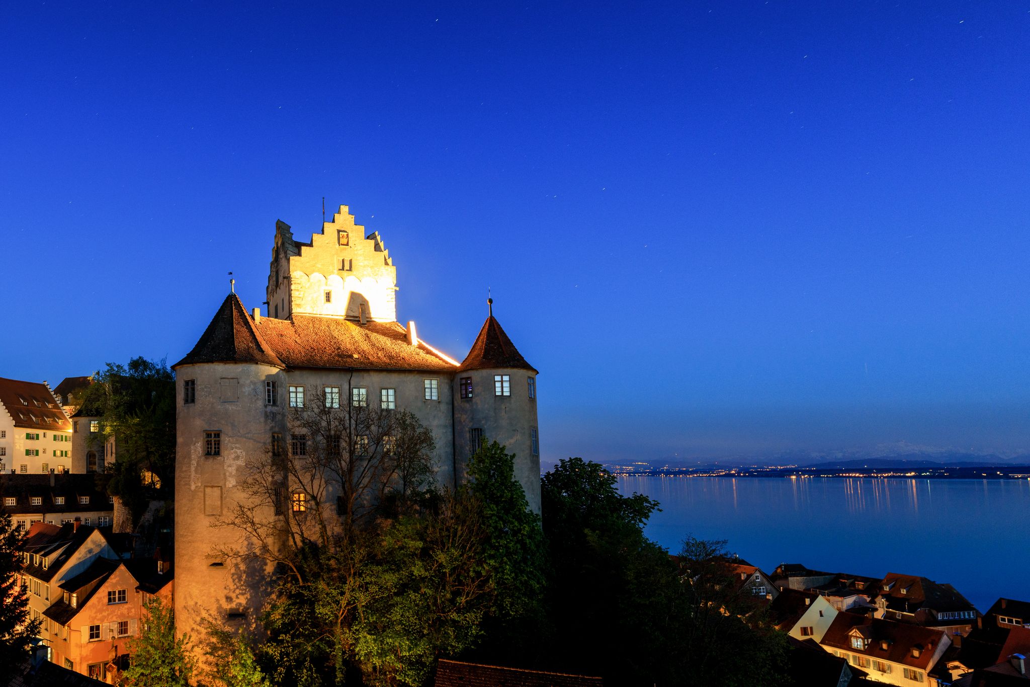 photo of panorama of castle Meersburg at night, Lake Constance, Baden Wuertemberg, Germany.