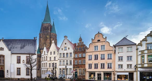 Photo of Market square with beautiful hisyorical houses and church in Warendorf, Germany.