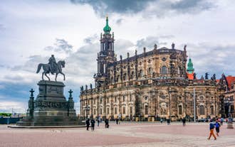 Photo of scenic summer view of the Old Town architecture with Elbe river embankment in Dresden, Saxony, Germany.