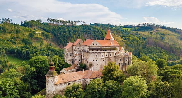 Photo of beautiful scenic aerial view of historical medieval Pernstejn castle, Czech Republic.