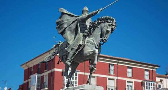 Photo of Ancient statue of medeival spanish soldier Rodrigo diaz de Vivar, El Cid in Burgos, Spain.
